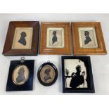 A pair of 19th century portrait silhouettes of a young lady and gentleman, 10cm by 7cm, together