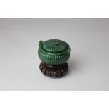 A Chinese carved jade pot and cover, with butterfly finial and two handles, 4.5cm high, (a/f - rest