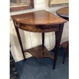An Edwardian inlaid rosewood corner occasional table on square tapered legs with platform stretcher,