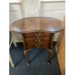 A Queen Anne style drop flap side / work table, with kidney shaped top above three drawers, the