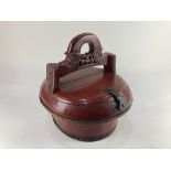 A Chinese red lacquer picnic basket, brass bound with carved handle, 31cm high