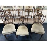 A set of four Edwardian inlaid salon chairs, with vase splats and turned legs, together with a