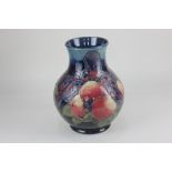 A Moorcroft Pottery 'Finch' baluster vase, designed by Sally Tuffin, with tube lined decoration of