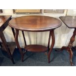 A mahogany oval side table on cabriole legs with undershelf, 69cm