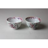 A pair of 19th century porcelain tea bowls with pink floral decoration