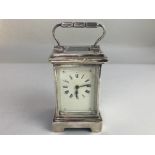 A Victorian silver cased carriage clock, maker Henry Matthews, Birmingham 1901, with bevelled