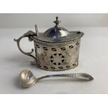 An Edward VII silver mustard, maker George Nathan & Ridley Hayes, Chester 1908, of pierced, engraved