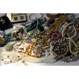 A quantity of costume jewellery, to include some silver jewellery and a rolled gold bangle