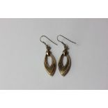 A pair of 9ct gold pierced oval drop earrings, 6.7g