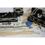 A pearl and malachite necklace, together with a quantity of costume jewellery and a powder compact