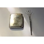 A George V silver cigarette case, H & W Co Ltd, Birmingham 1915, monogrammed RB, together with a