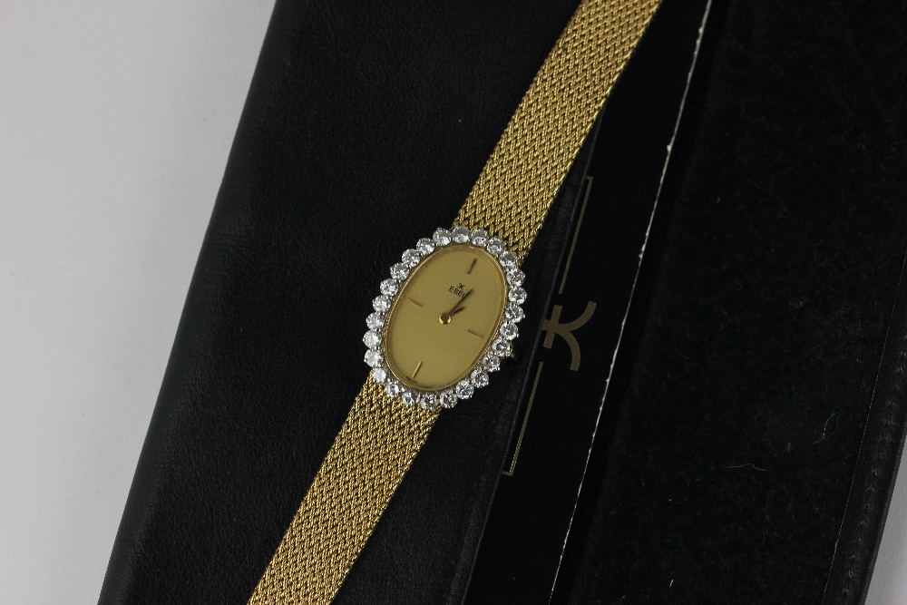 Ebel. A lady's 18ct gold and diamond bracelet watch oval dial with a twenty six stone diamond