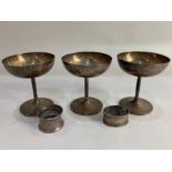 A set of three George V silver trophy cups, maker Elkington & Co, Birmingham 1928, 1929, 1930, all