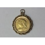 A 1900 half sovereign in a 9ct gold pendant mount