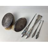 A pair of George V silver backed clothes brushes, maker Levi & Salaman, Birmingham 1925, (a/f