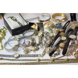 A quantity of costume jewellery and watches