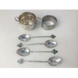 A set of four George V silver coffee spoons, maker Joseph Cook & Son, Birmingham 1927, with twist