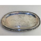 A Mexican sterling silver oval tray, maker Anaya, with raised scroll border, 24.5cm 9.3oz