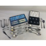 A cased set of six George V cased silver bean handled coffee spoons, makers Cooper Brothers & Sons