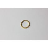 A 22ct gold wedding ring 2.9g