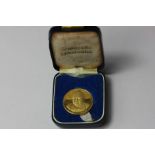 A 22ct gold Winston Churchill 'V' for Victory medallion by Gregory & Co., 8.4g