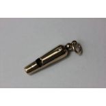 A 9ct gold miniature whistle, 2.6g