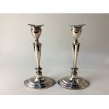 A pair of George V silver candlesticks, maker Williams Ltd, Birmingham 1920, of oval form with