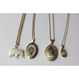 An 18ct gold mounted citrine teardrop pendant with chain, a 9ct gold commemorative locket with