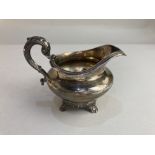 A William IV silver milk jug, maker Charles Fox, London 1837, with scroll handle, 6.2oz