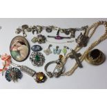 A quantity of costume jewellery to include some silver jewellery and a silver ingot pendant