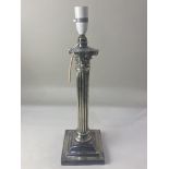 A silver plated Corinthian column table lamp, 40cm high