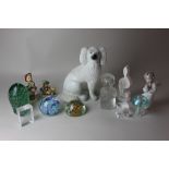 Seven various glass paperweights including one in the form of a book, 7cm, and another as a