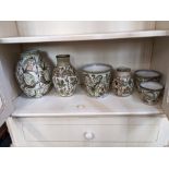 A collection of five Glyn Colledge for Denby stoneware vases and jardinieres, each with floral and