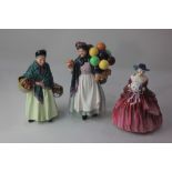 Three Royal Doulton porcelain figures of ladies, The Orange Lady, Genevieve and Biddy