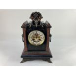 A 19th century Henri Marc of Paris black slate and red marble mantle clock, the circular dial with