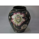 A Moorcroft pottery 'Gustavia Augustus' baluster vase, with tube lined decoration of pink and