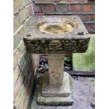 A composite three section bird bath, with stone effect square top and support on square base, 61cm