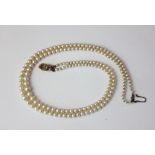A single string pearl necklace with a 9ct gold clasp, 40cm