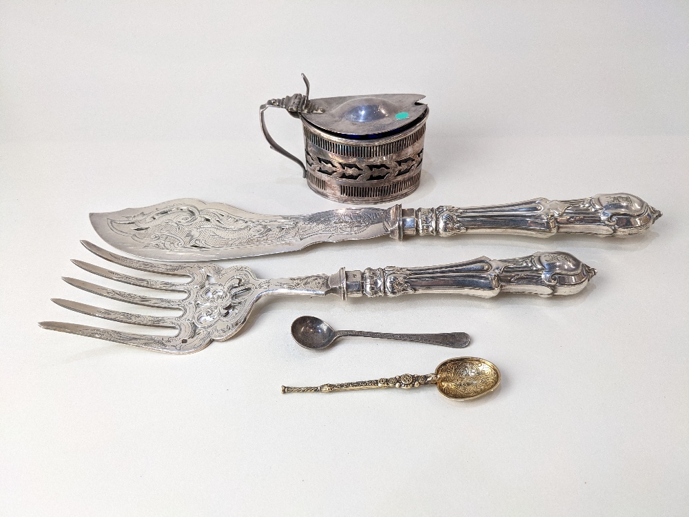 A pair of Elkington and Co. silver plated fish servers with engraved and pierced decoration to blade