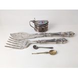 A pair of Elkington and Co. silver plated fish servers with engraved and pierced decoration to blade