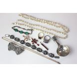 Three various pendants two bracelets, a marcasite bow brooch, two rings, beads, necklace, etc