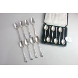 A cased set of six George V silver teaspoons with seal shape terminals maker Mappin and Webb,