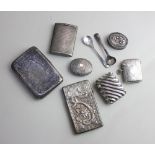 A Victorian silver vesta case with deep ribbed design, three other various silver vestas, a