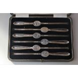 A cased set of six George V silver lobster picks, with central oval panel of a fish, maker John