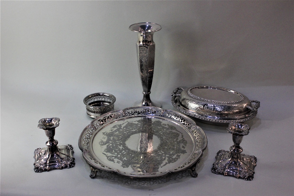 A silver plated circular serving tray with beaded and pierced border, 36cm, an oval tureen and