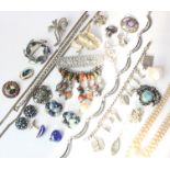 A small collection of costume jewellery to include beaded necklaces, brooches and a George VI