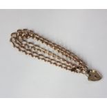 A 9ct gold double chain bracelet with padlock clasp 20g