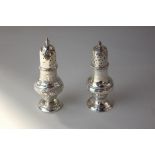 A late 18th / early 19th century silver castor baluster shape with beaded edges, marks rubbed and an