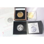 A 2009 St George & Dragon gold plated silver five pound coin with inset rubies and enamel, cased