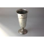 A George V silver vase with knopped stem on circular base, engraved with floral swags and bows,